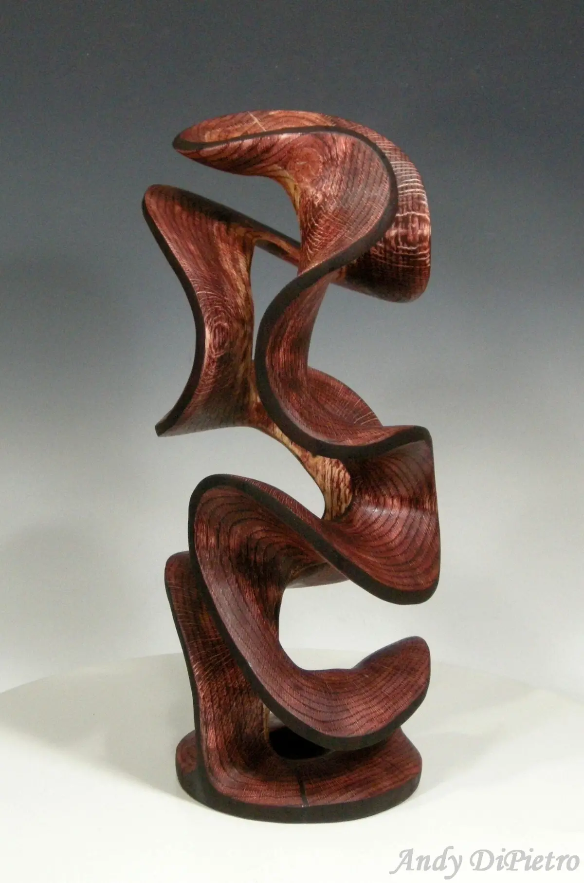 Carved Sculpture "Burgundy Twist" By Andy Dipietro 1